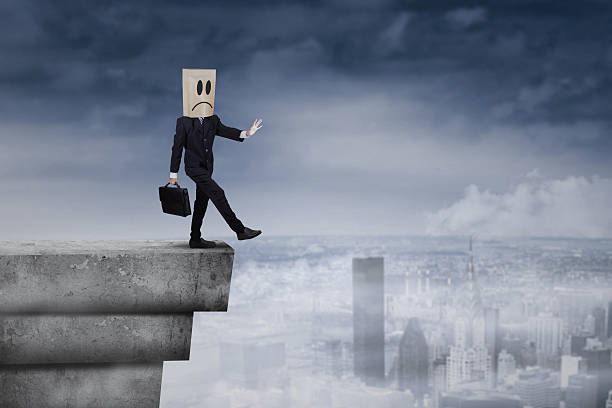istock Businessman with cardboard head on rooftop 1 501516123