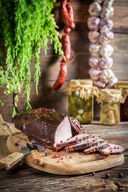 istock Rural smokehouse ham preparation for smoking 501516513