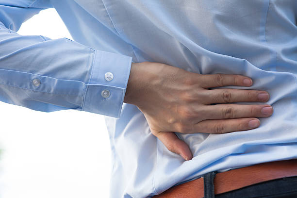 istock Man in office uniform having back pain / back injury 501516616