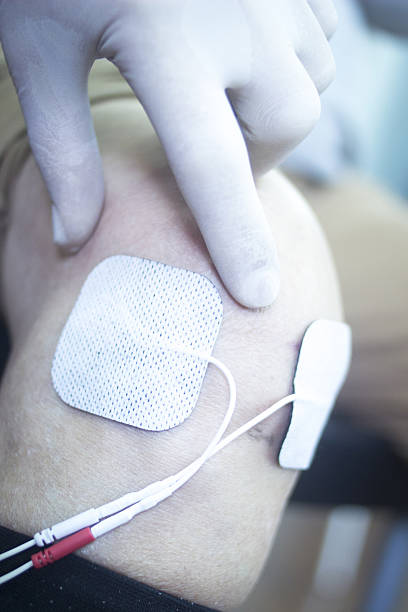 istock Patient leg knee in physiotherapy treatment 501520250