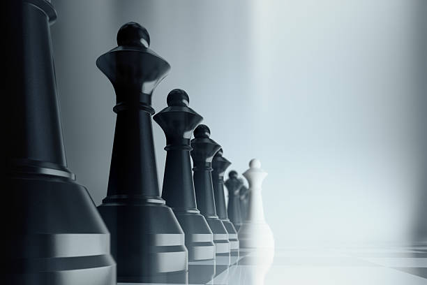 istock Competion concept with black and white pawns 501520404