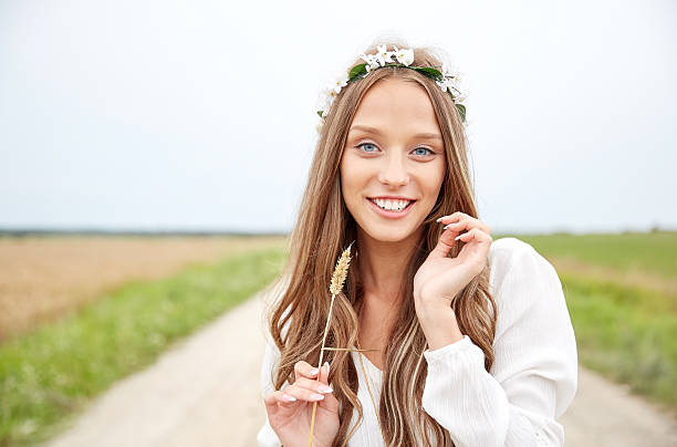 istock smiling young hippie woman on cereal field 501520486