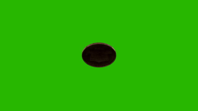 Flipping a Coin Top View on a Green Screen Background