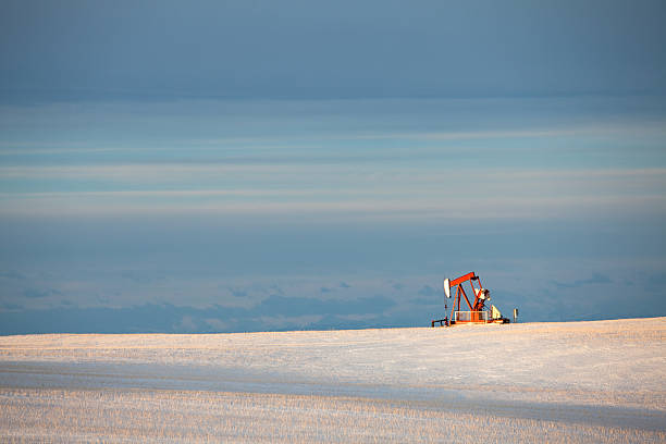 Pumpjack on the Prairie Oil industry. Alberta, Canada. oil pump oil industry alberta equipment stock pictures, royalty-free photos & images