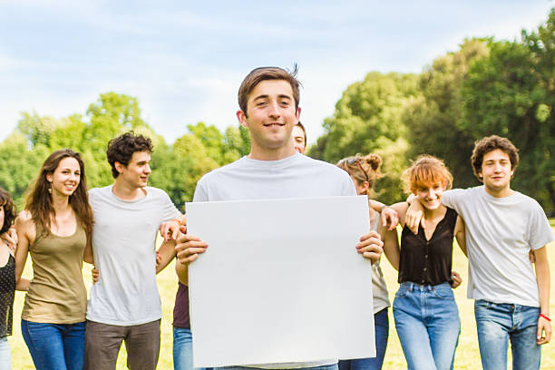 istock Young man holding blank sign 501531713