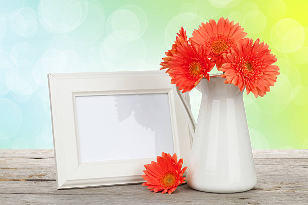 istock Orange gerbera flowers and photo frame 501532577