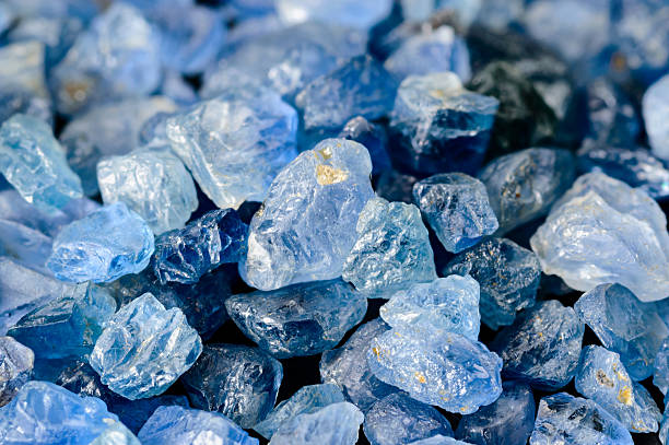 Set of blue sapphires Set of uncut, rough and raw blue sapphires. sapphire stock pictures, royalty-free photos & images