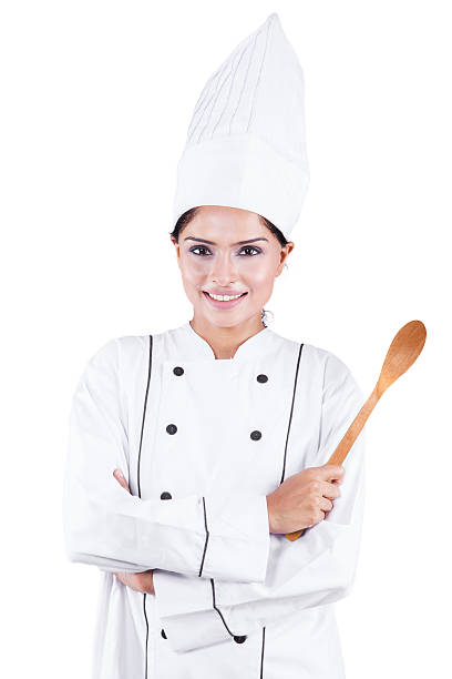 istock Indian female chef holding wooden spoon 501533648