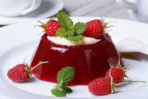 istock Delicate dessert raspberry jelly with mint and cream 501536499