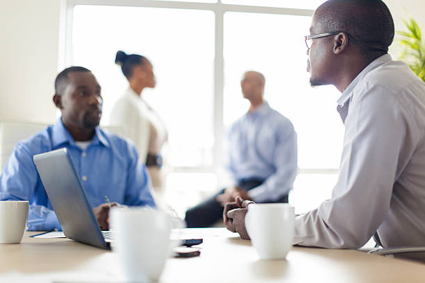 istock African business colleagues having a conversation in the boardroom 501536865