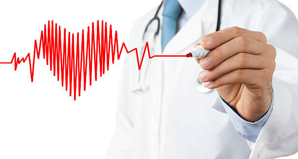 Male doctor drawing heart beat