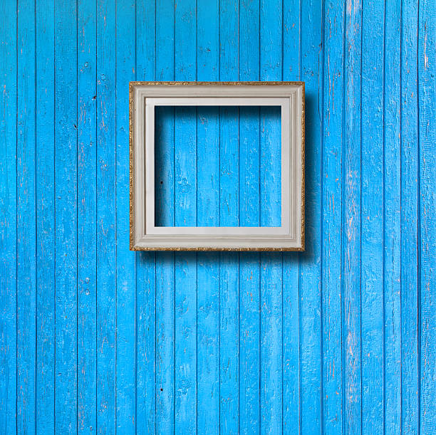 istock Vintage frame for picture on blue wooden wall 501537153