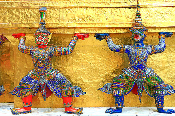 istock Giant Statues (Thai Golden Demon Warrior) in Temple 501538402