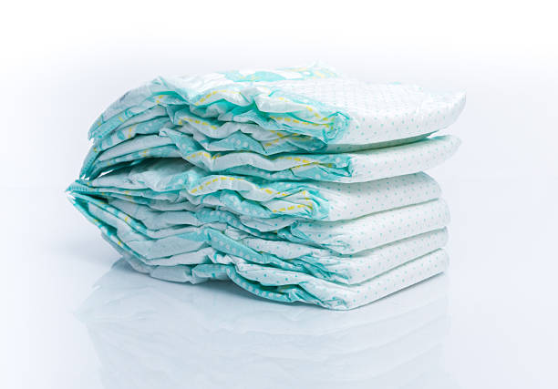 istock Pile of diapers isolated and reflected on white background 501538836