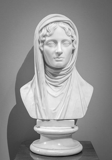 istock White marble head of young woman 501539190