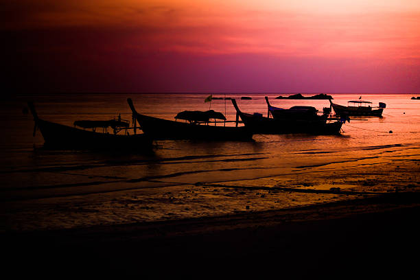 istock ship was at sea during sunset. 501539454