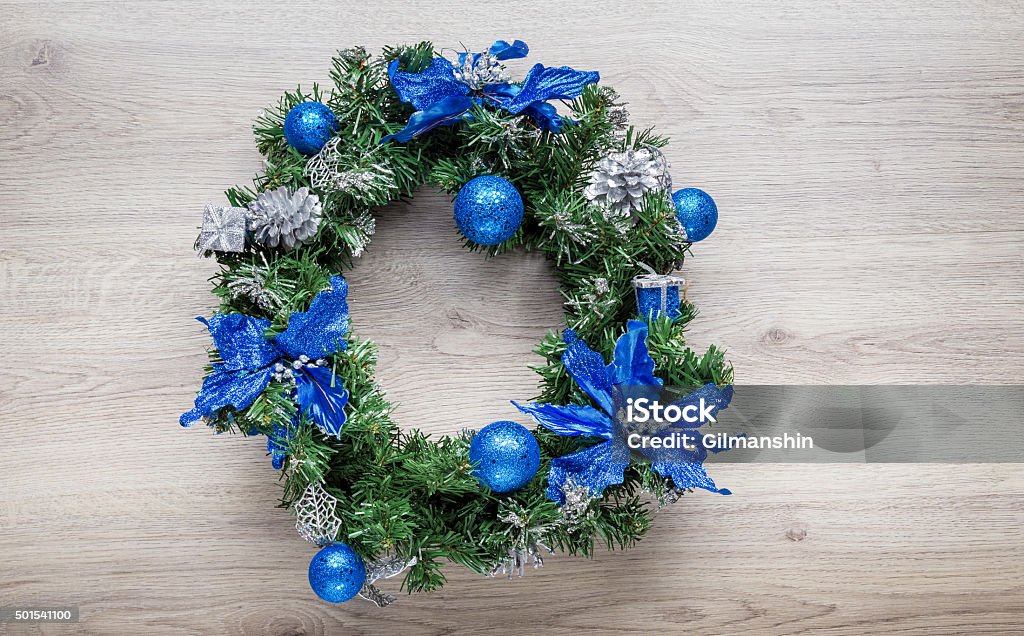 Christmas blue wreath on wood Christmas blue wreath on wood. 2015 Stock Photo