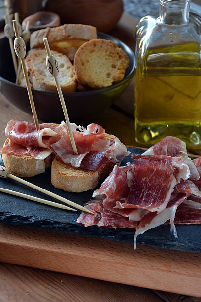 istock appetizer of ham Serrano with bread roasted 501542680