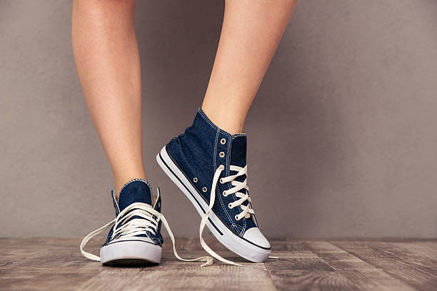 istock Human legs in sneakers 501543114