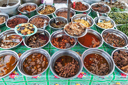 burmese curry buffet at street stall in yangon myanmar market