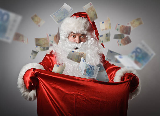 babbo natale e un sacco di euro. - holiday emotional stress christmas santa claus foto e immagini stock