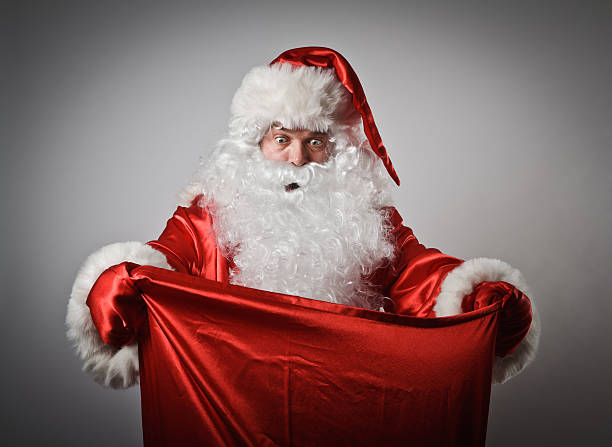 babbo natale e un sacco di - santas sack foto e immagini stock