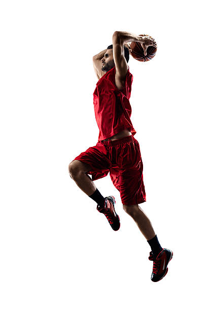 istock Isolated basketball player in action is flying high 501546260