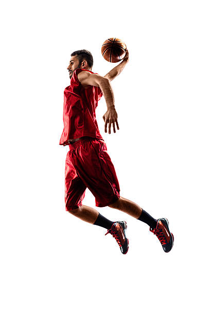 istock Isolated basketball player in action is flying high 501546262