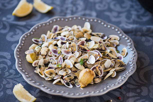 istock Stir fried clams with roasted paste,garlic, lemon, cilantro 501546570