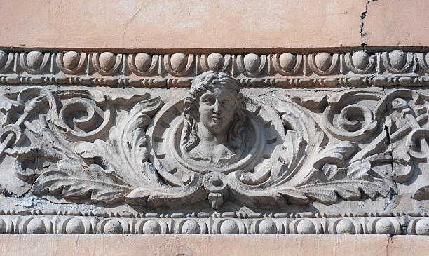 istock Decor on a historic building in form female head 501547425