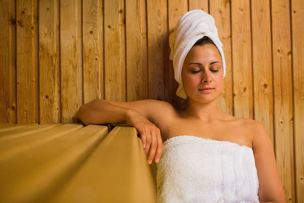 istock Calm woman relaxing in a sauna 501547635