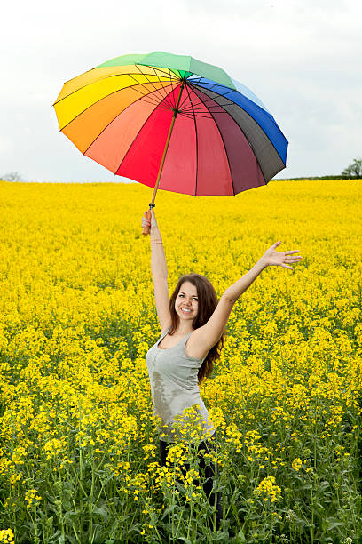 istock Happy woman on the rape field 501548711