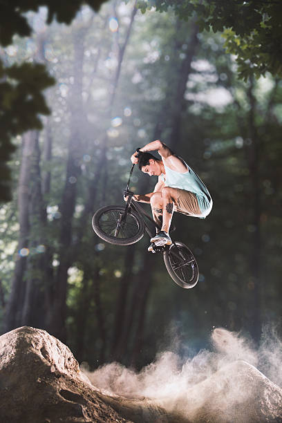 istock bmx bike rider in the forest 501549092