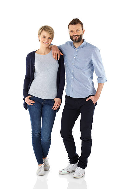 istock Stylish young couple posing together over white 501549127