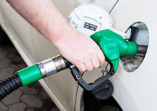 istock fill on unleaded fuel to the car 501549783