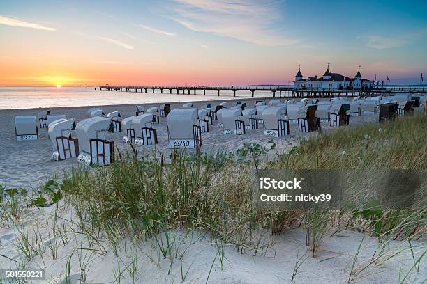 Pier Ahlbeck At Sunrise Stock Photo - Download Image Now - Ahlbeck, Baltic Sea, Hooded Beach Chair