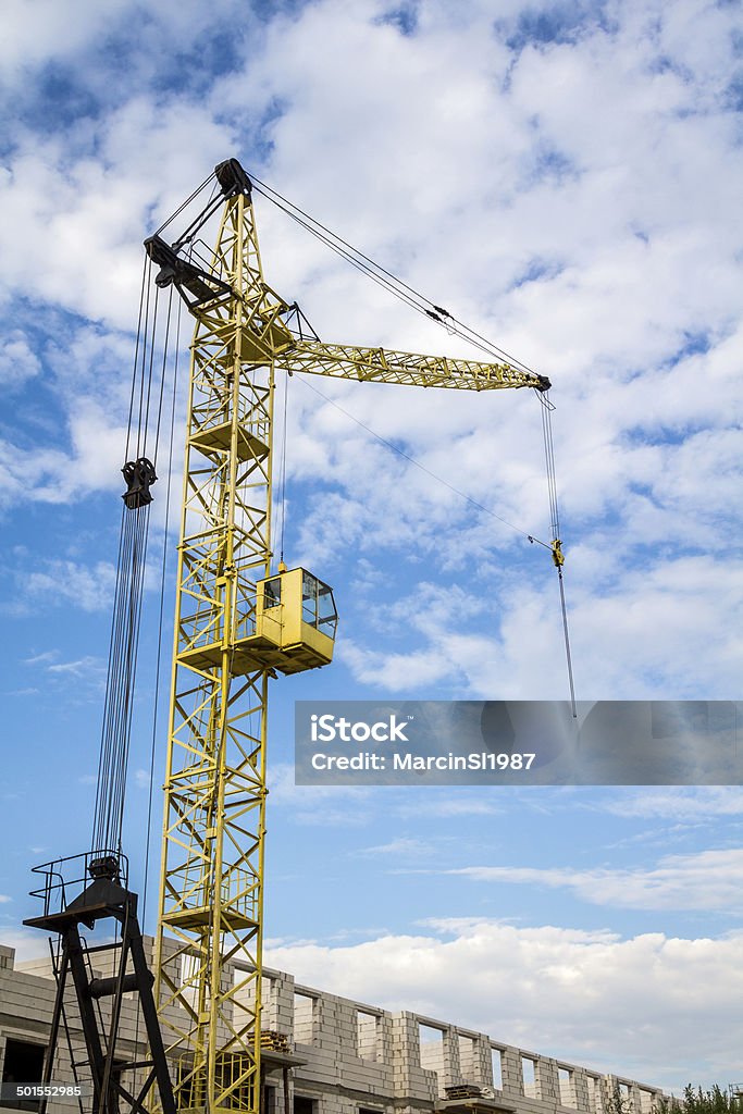 Cranes side Cranes side view, construction site. Buliding and architecture. Activity Stock Photo