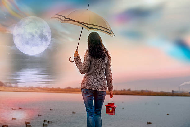 istock The woman and the full moon 501566012