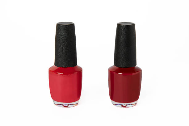 red and fuchsia nail polish bottle