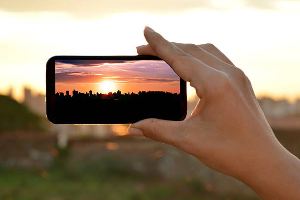 istock Sunset seen at a smart phone 501567212