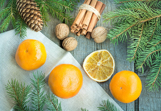 istock Christmas still life with mandarins and cinnamon. Top view. 501569298