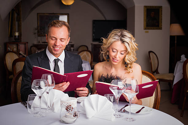 istock Couple choosing what to eat at restaurant 501570582