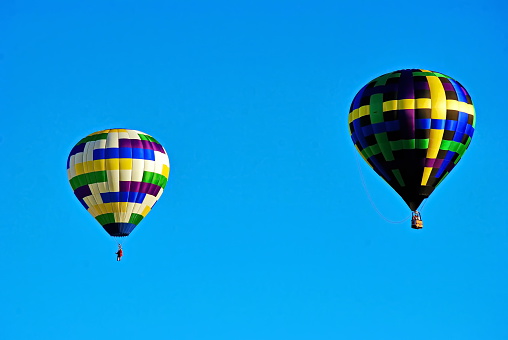 Two hot air balloons in the sky above Driggs, Idaho