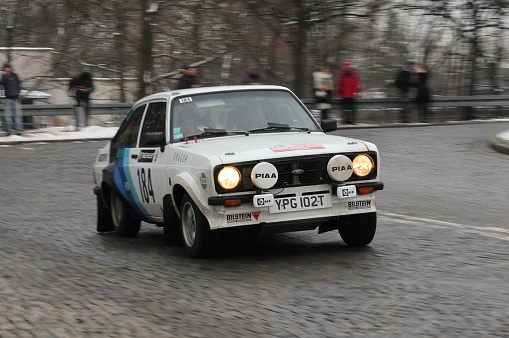 Warsaw, Poland - 27th January, 2011: Ford Escort MK2 (1974–1981) in historic rally specification riding on the street during the Monte Carlo Historique Rally. The late 1970s were a very successful period in rallying for Ford in Europe. Almost all winnings were made on Escort MK2.