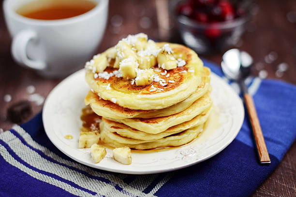 istock Healthy banana pancakes with coconut flakes 501572304