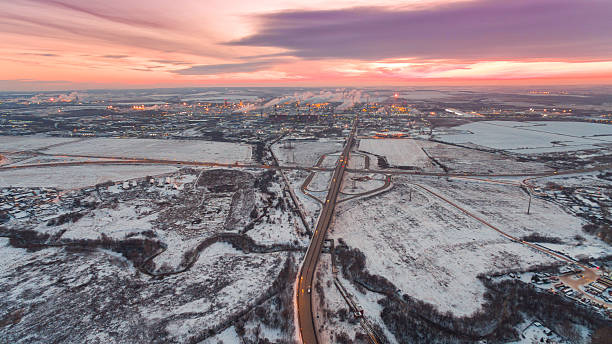 istock high road and industrial district at sunset in winter 501572572