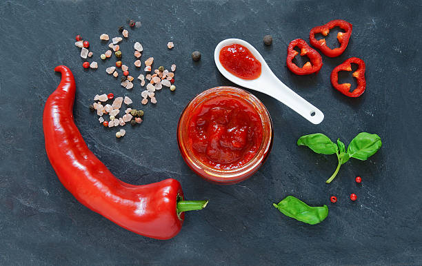 istock sweet pepper jam on the black ceramic background 501573302