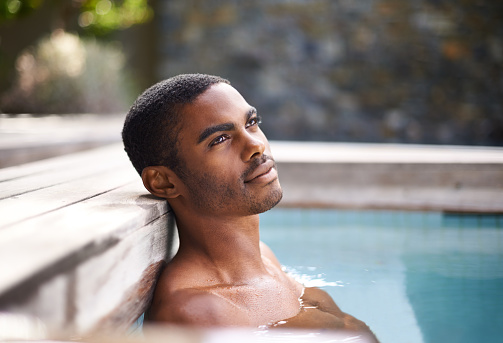 Shot of a handsome young man relaxing in a poolhttp://195.154.178.81/DATA/i_collage/pi/shoots/783491.jpg
