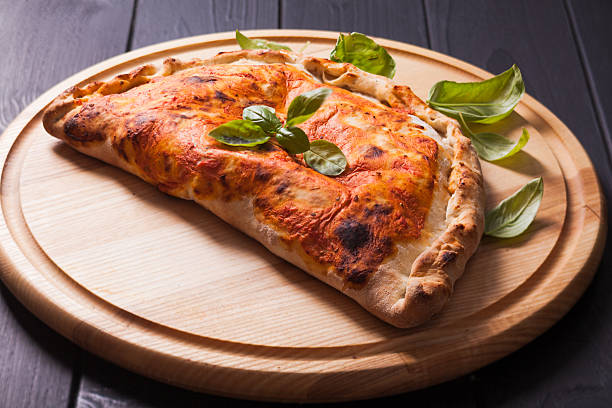 The Pizza calzone stock photo