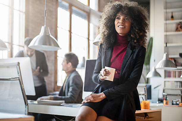 istock Portrait of smiling office worker relax having a coffee 501576766